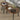 Rustic nesting coffee tables with smooth wood surface and anti-scratch metal legs.