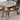 Rustic oblong nesting coffee tables with walnut finish and black metal legs.