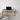Invisible folding table attached to the wall, demonstrating a compact and elegant solution for small spaces.