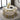 Modern round marble dining table for contemporary dining rooms.