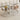 Minimalist modern glass nesting coffee tables with sleek round shape and steel frames.